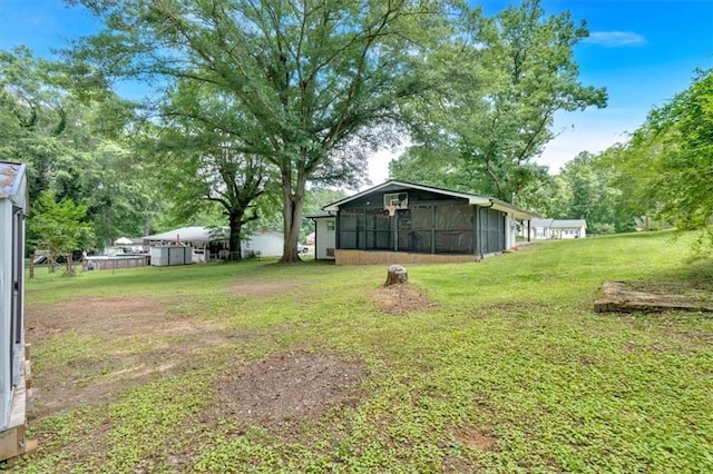 1162 Newtown Church Rd NE, Calhoun, GA 30701 - view of green lawn featuring a sunroom