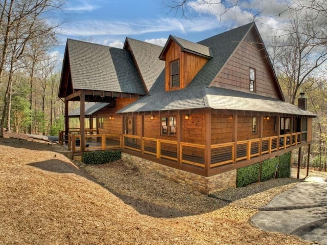 115 Coldwater Creek Dr, Mineral Bluff, GA 30559 - view of front facade with a porch, roof with shingles, and a chimney