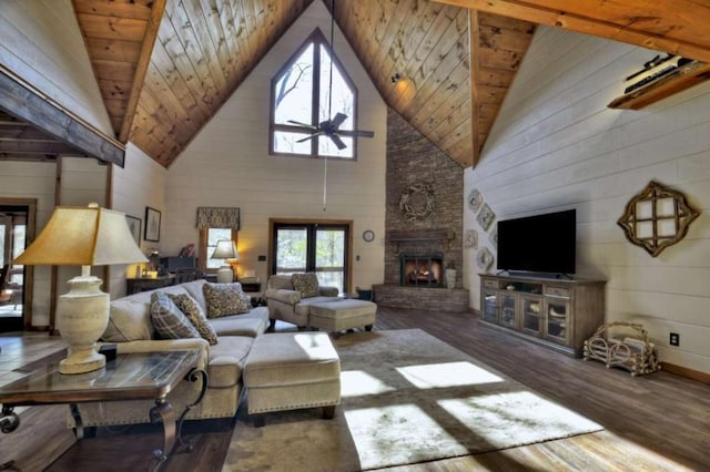 115 Coldwater Creek Dr, Mineral Bluff, GA 30559 - living area with wood finished floors, ceiling fan, a fireplace, and high vaulted ceiling