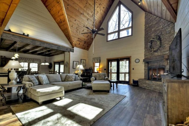 115 Coldwater Creek Dr, Mineral Bluff, GA 30559 - living room with high vaulted ceiling, dark wood-style floors, plenty of natural light, ceiling fan, and a wooden ceiling with exposed beams
