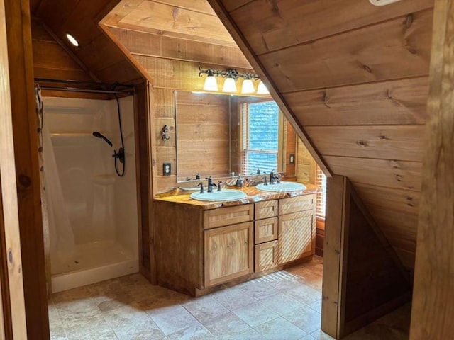 115 Coldwater Creek Dr, Mineral Bluff, GA 30559 - bathroom featuring lofted ceiling, wood ceiling, wood walls, double vanity, and a stall shower