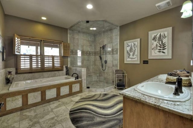 115 Coldwater Creek Dr, Mineral Bluff, GA 30559 - full bath featuring a garden tub, a stall shower, double vanity, recessed lighting, and a wood stove