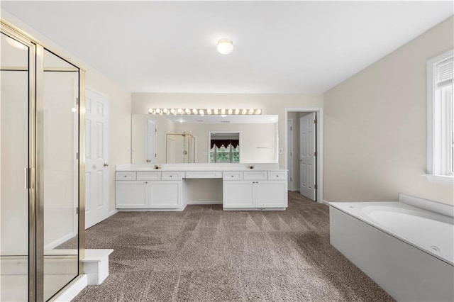 5312 Tormeal Trce, Suwanee, GA 30024 - full bath featuring carpet flooring, a stall shower, vanity, a bath, and healthy amount of natural light