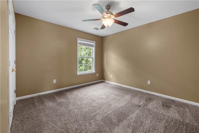 5312 Tormeal Trce, Suwanee, GA 30024 - carpeted empty room with ceiling fan and baseboards