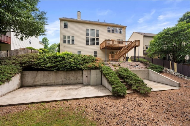 5312 Tormeal Trce, Suwanee, GA 30024 - back of property featuring stairs, a patio area, a chimney, and a deck