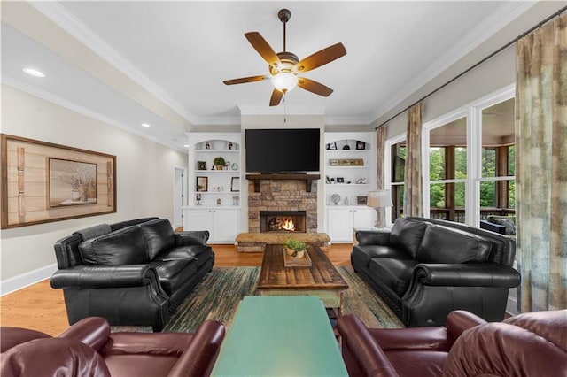 989 Pink Williams Rd, Dahlonega, GA 30533 - living area featuring ornamental molding, wood finished floors, ceiling fan, a stone fireplace, and baseboards