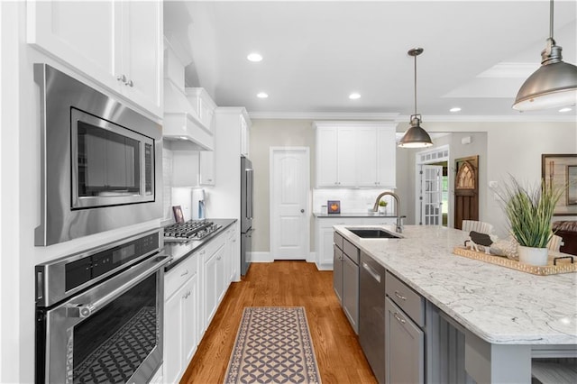 989 Pink Williams Rd, Dahlonega, GA 30533 - kitchen with stainless steel appliances, a sink, white cabinets, an island with sink, and recessed lighting