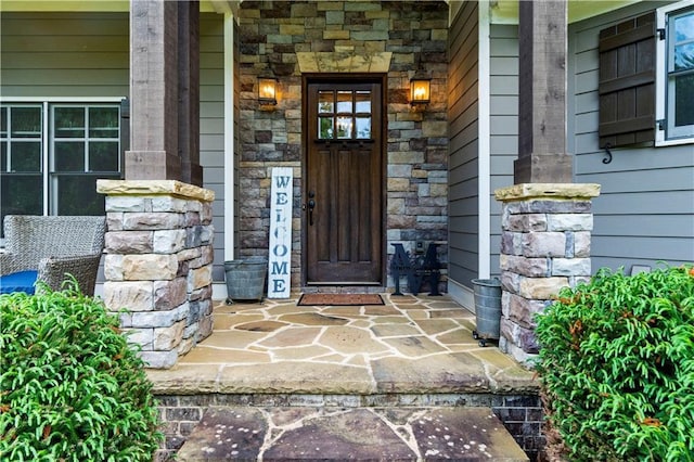 989 Pink Williams Rd, Dahlonega, GA 30533 - doorway to property featuring stone siding and a porch