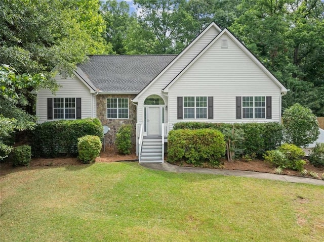 single story home with a front lawn