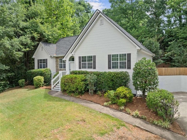 view of front of property with a front yard