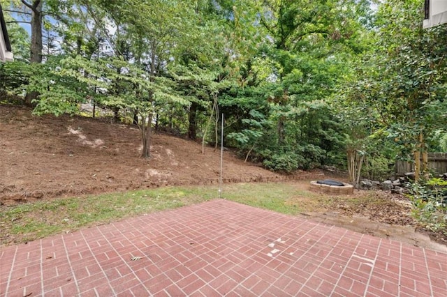 view of patio featuring a fire pit