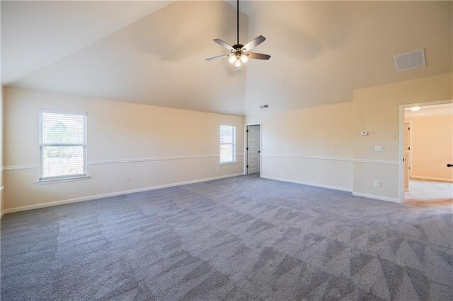 bathroom with tile patterned floors, vanity, and lofted ceiling