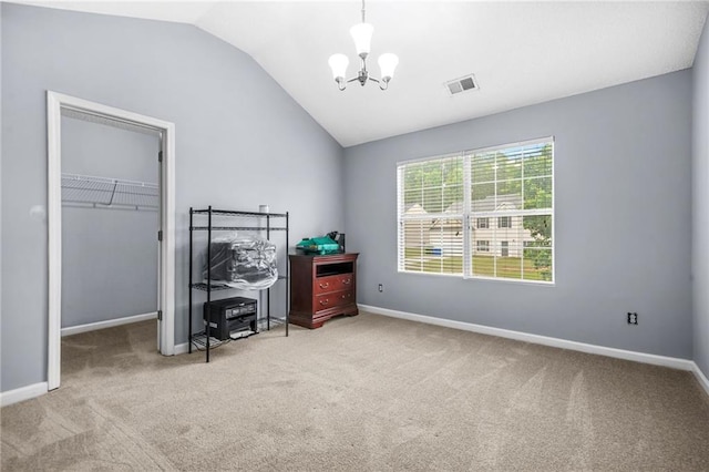 bedroom with carpet flooring, visible vents, vaulted ceiling, and a notable chandelier