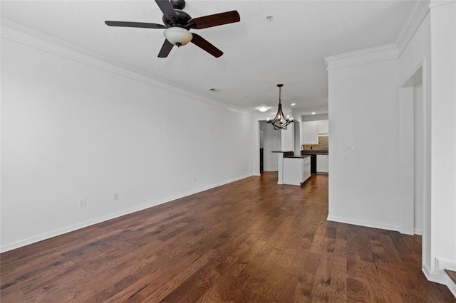 400 17th St NW Unit 1321, Atlanta, GA 30363 - unfurnished living room featuring a chandelier, ornamental molding, a ceiling fan, dark wood-style flooring, and baseboards
