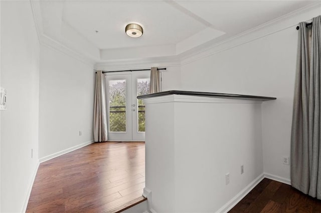 400 17th St NW Unit 1321, Atlanta, GA 30363 - hall with dark wood-style flooring, a raised ceiling, french doors, and baseboards