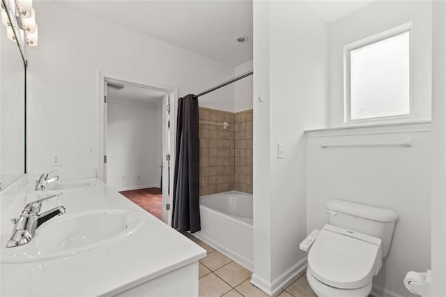 400 17th St NW Unit 1321, Atlanta, GA 30363 - bathroom featuring double vanity, toilet, shower / bath combo with shower curtain, and tile patterned floors