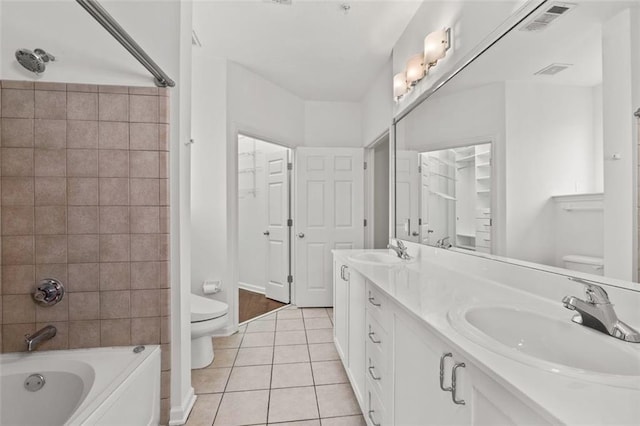 400 17th St NW Unit 1321, Atlanta, GA 30363 - full bathroom featuring toilet, tile patterned floors, double vanity, and bathing tub / shower combination