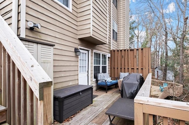 wooden deck with area for grilling