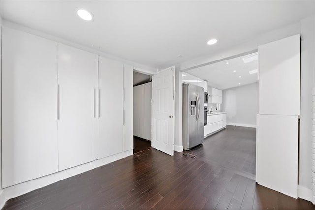 2123 Drew Valley Rd NE, Brookhaven, GA 30319 - basement with stainless steel refrigerator with ice dispenser, dark wood-type flooring, and recessed lighting