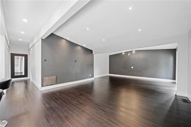 2123 Drew Valley Rd NE, Brookhaven, GA 30319 - unfurnished living room with baseboards, wood finished floors, and recessed lighting