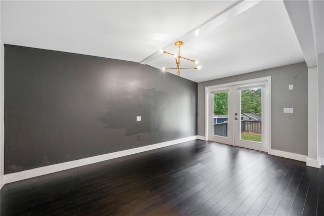 2123 Drew Valley Rd NE, Brookhaven, GA 30319 - empty room featuring baseboards, french doors, a chandelier, and dark wood finished floors