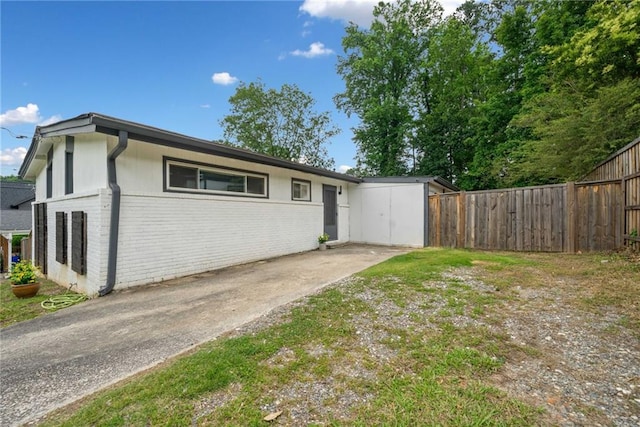 2123 Drew Valley Rd NE, Brookhaven, GA 30319 - view of front facade featuring brick siding and a patio area