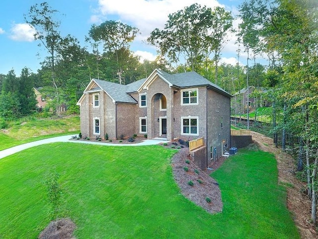 view of front of home with a front lawn