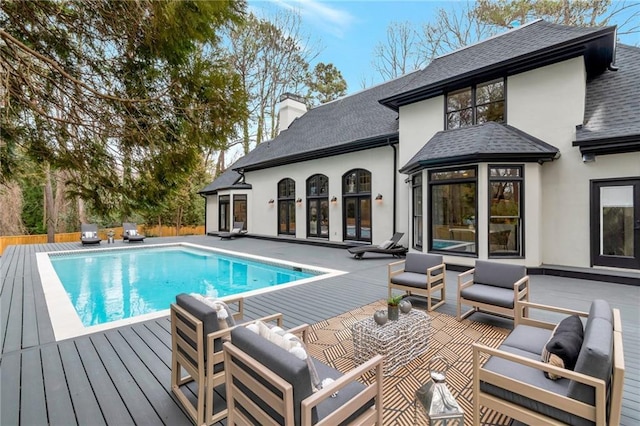 view of swimming pool with outdoor lounge area