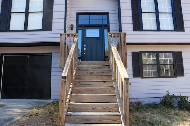 property entrance with a garage