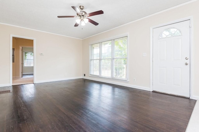 entryway with ceiling fan, dark hardwood / wood-style floors, and crown molding