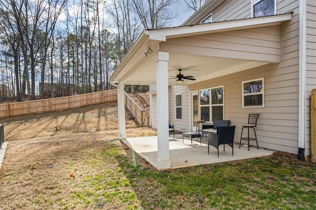 view of yard featuring a patio and ceiling fan