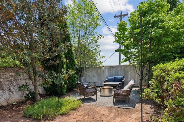 view of patio / terrace featuring fence