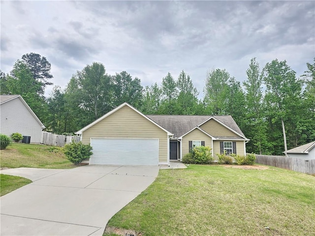 single story home featuring a garage, a front yard, and fence