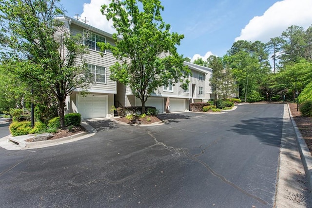 view of front of home featuring driveway and a garage