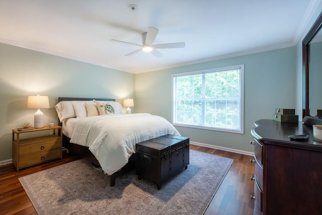 bedroom with crown molding, a ceiling fan, baseboards, and dark wood-style floors