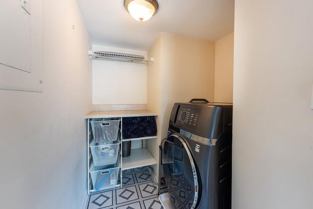 washroom featuring washer / dryer and laundry area