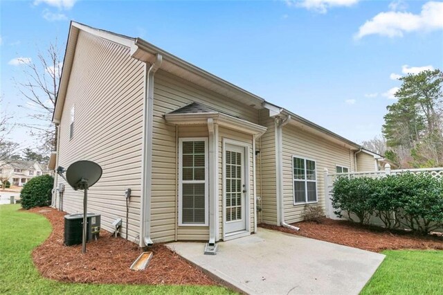 184 Darbys Crossing Ct, Hiram, GA 30141 - rear view of property featuring a patio area, a lawn, and central air condition unit