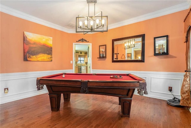 game room with wood-type flooring, billiards, and crown molding