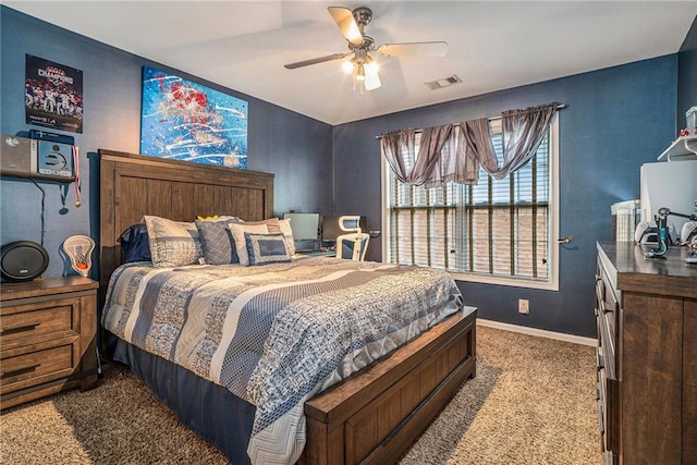 carpeted bedroom with ceiling fan