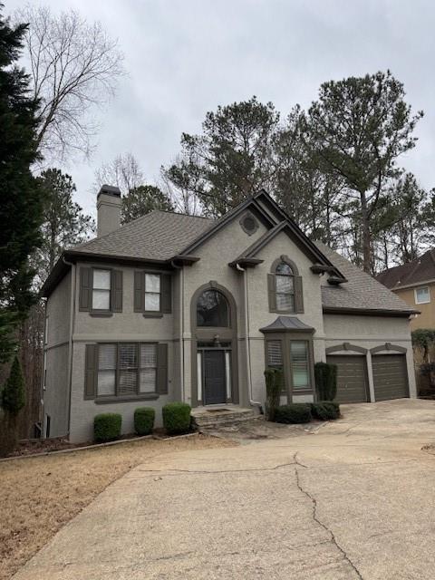 view of front of property with a garage