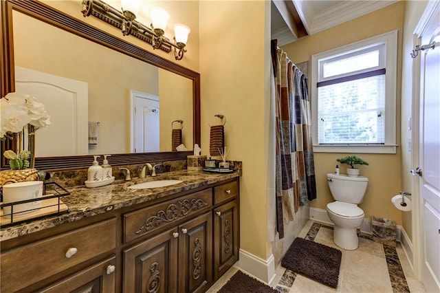 full bath featuring toilet, ornamental molding, vanity, and baseboards