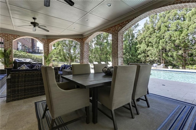 view of patio / terrace featuring an outdoor pool, a ceiling fan, and outdoor lounge area