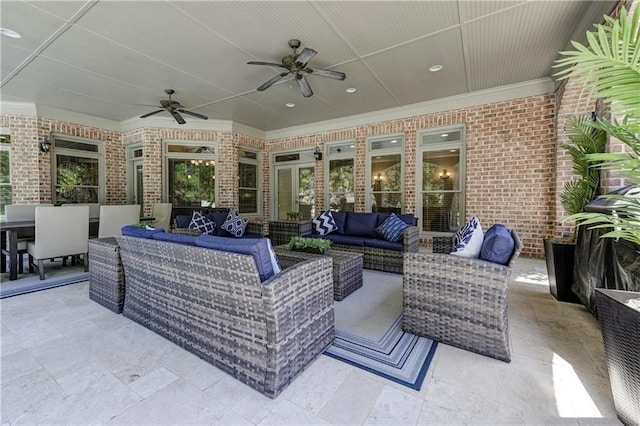 view of patio / terrace featuring outdoor lounge area, outdoor dining space, and ceiling fan