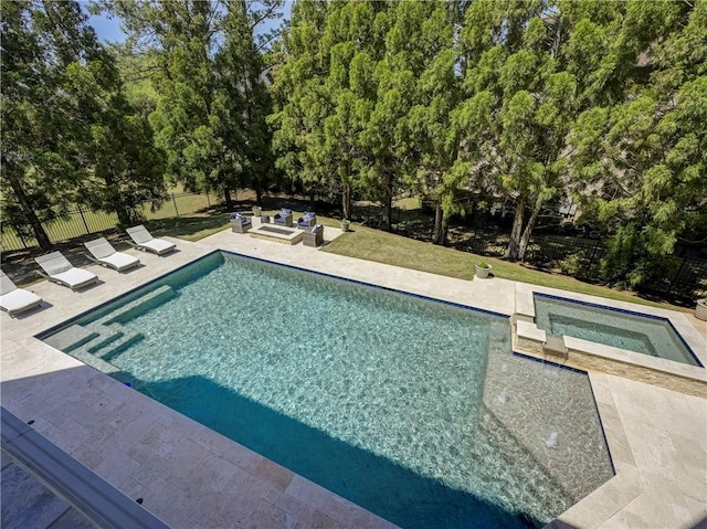 view of pool with an outdoor living space, fence, a patio, a fenced in pool, and an in ground hot tub