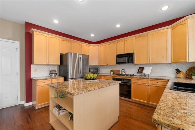 dining room with wood-type flooring, a high end fireplace, crown molding, and an inviting chandelier