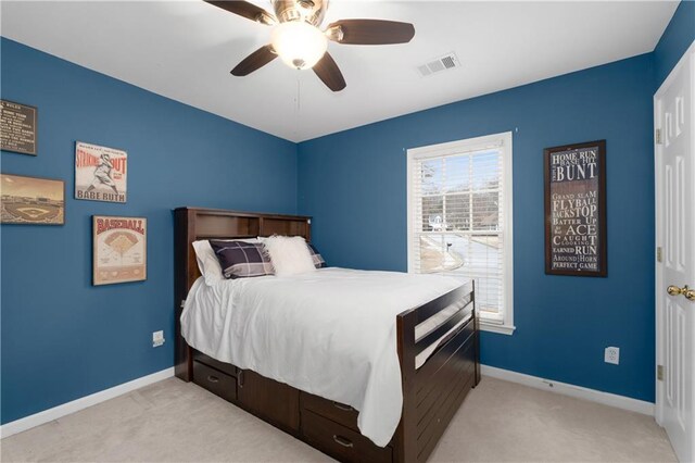 bathroom with ceiling fan and vanity