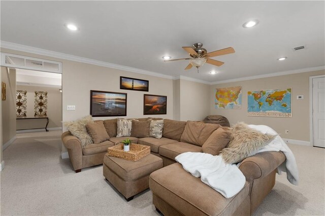 living room with crown molding, carpet floors, and ceiling fan