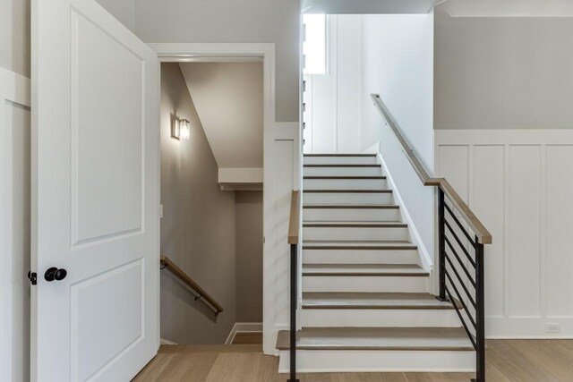 4781 Falling Brook Dr, Flowery Branch, GA 30542 - stairway featuring wood finished floors