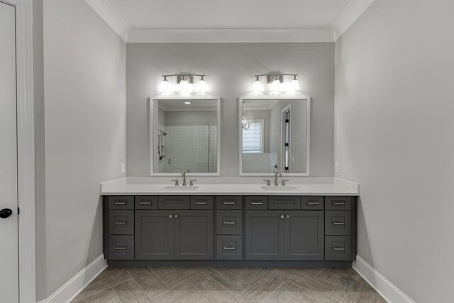 4781 Falling Brook Dr, Flowery Branch, GA 30542 - bathroom with double vanity, tiled shower, ornamental molding, and baseboards
