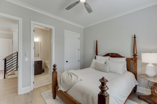4781 Falling Brook Dr, Flowery Branch, GA 30542 - bedroom with ornamental molding, light wood-style flooring, ensuite bath, baseboards, and ceiling fan